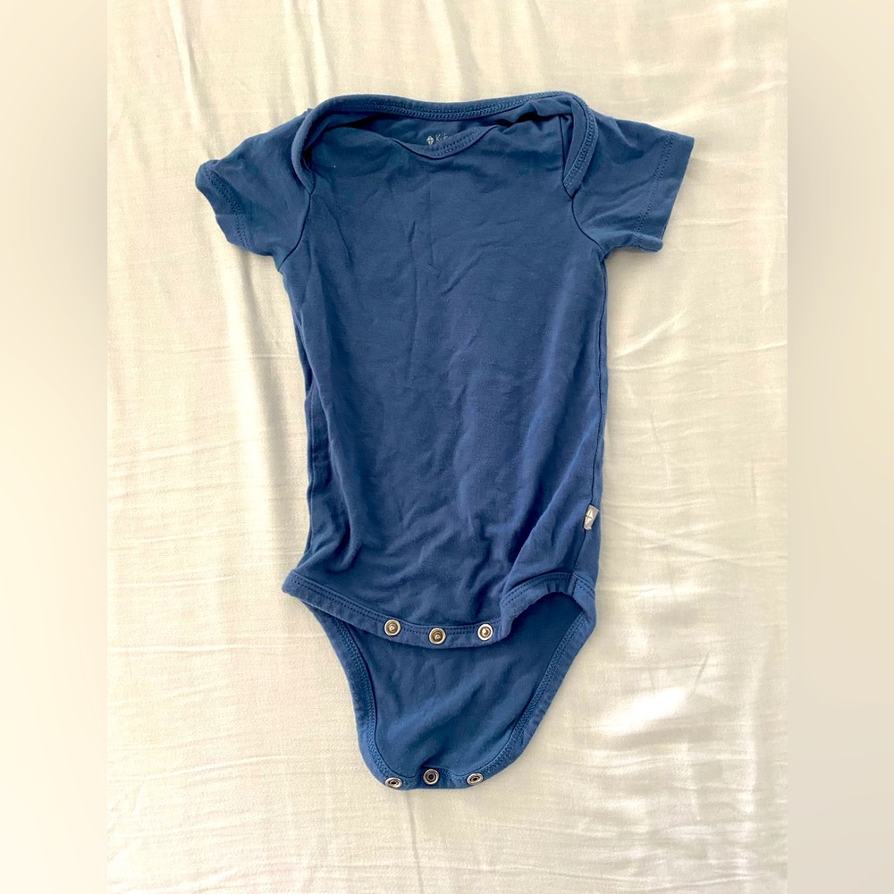 Kyte baby onesie in blue.